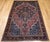 "An early 20th century Persian Farahan Sarouk area rug in a classic medallion pattern of refined elegance. Hand-knotted...