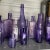 American Large Collection of Antique Purple Glass Bottles- Set of 16 For Sale - Image 3 of 11