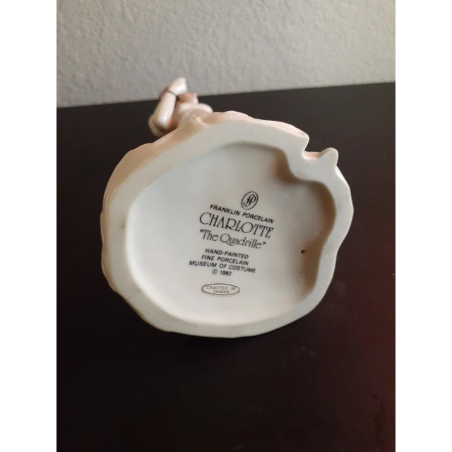This is Franklin Mint Fine Porcelain 8" handpainted Figurine " Charlotte The Quadrille" Procured at an auction BOX 6