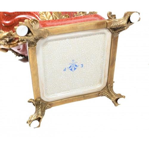Delightful pair of French porcelain urns adorned with ormolu cherubs Visually arresting pair which first grabbed our...