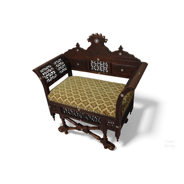 This is very beautiful and incredibly ornate Islamic Bench chair . The Bench is in a warm walnut and is decoratively...