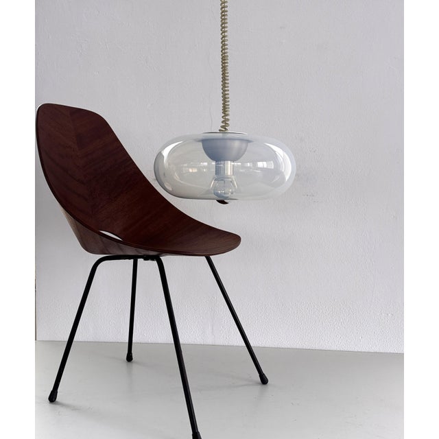 Beautiful and shiny handblown pendant light in Murano Opaline transparent glass with opaline glass effect with internal...