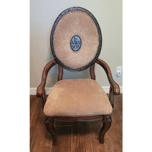 These chairs have been in our family for years. Not sure where my Mom bought them. Elegant dining chairs, used only for...