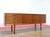 Elevate your home with the exquisite Mid Century Modern Vintage Teak Credenza sideboard by renowned furniture maker...