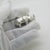 This vintage silver wildlife sculpture depicts a rhinoceros, crafted as a desktop display piece, paperweight, or cabinet...