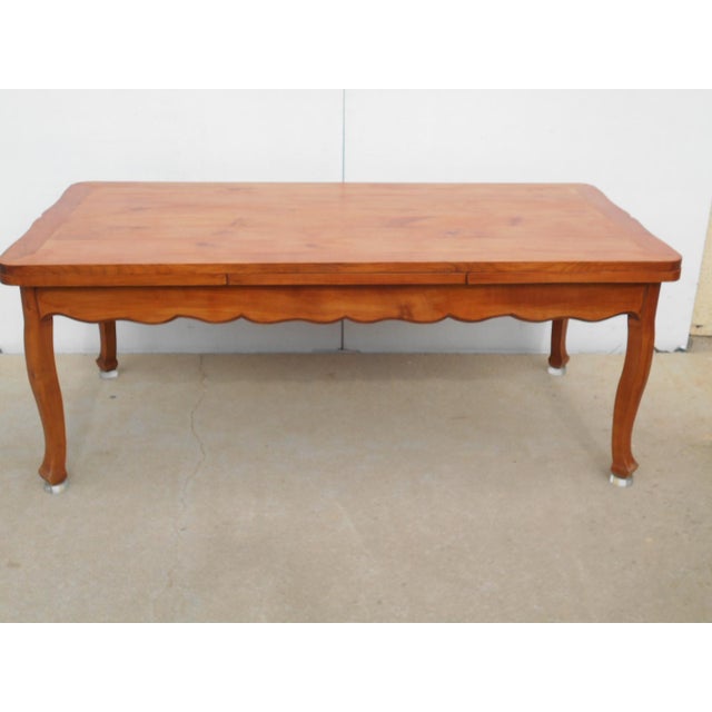 Large tabletop measuring 200 cm x 100 cm and 32 mm thick. Integrated 60 cm extensions are stored beneath the tabletop,...