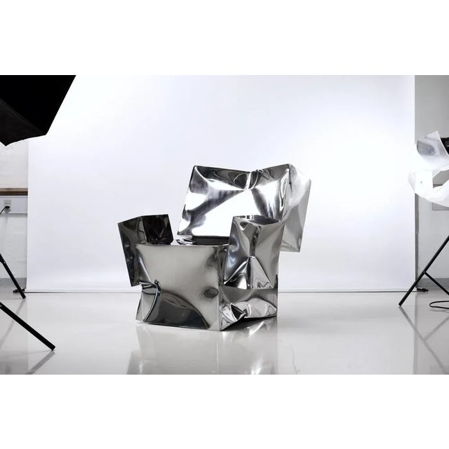 Defeated Narcissist Armchair by Studio Yolk Dimensions: W 92 x D 86 x H 83 cm Materials: Polished Stainless Steel This is...