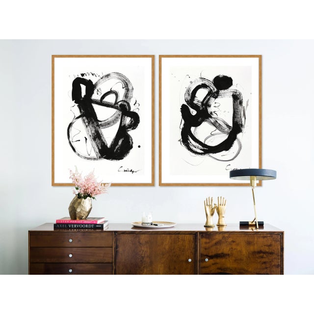 DESCRIPTION: Noir Et Blanc Diptych by Lesley Grainger in Gold Frame, Medium Art Print SPECIFICATIONS: Type: Framed Paper....
