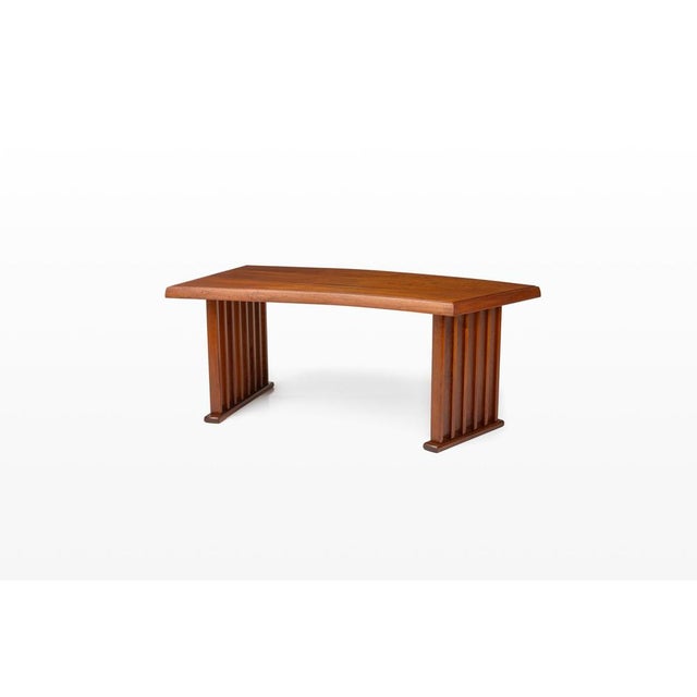 This Danish vintage desk is made of teak wood. This desk was made by a local Danish carpenter on behalf of the previous...