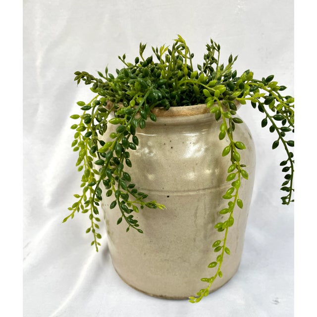 Vintage hand crafted French confit jar. Originally created to store food. The neutral palette of this classic pot have...