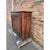 An antique French confiturier cabinet, likely dating to the Late 18th century, features traditional country styling...