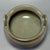 A graceful Chinese celadon tripod vessel, crafted with elegant upward‑curving twin side handles. Rounded bulbous body...