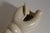 A sculptural shell vase by c.h. Brannam, barnstaple, england, dating to approximately 1965. Modelled as an elongated...