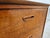 A classic Lane six drawer dresser with walnut veneers and wooden drawer pulls. The top is laminate. One drawer has a...