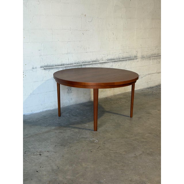 Dyrlund Lotus Round Teak Dining Table With Flip-Out Extension Leaves – Vintage Danish Mid-Century Modern For Sale - Image 12 of 12