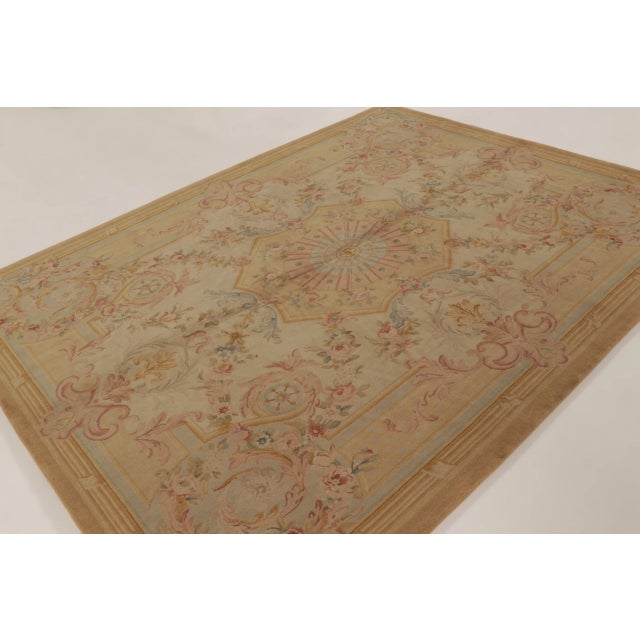 This 8x10 antique French Aubusson rug is a finely woven wool piece from France dating to circa 1890–1900. The rug features...