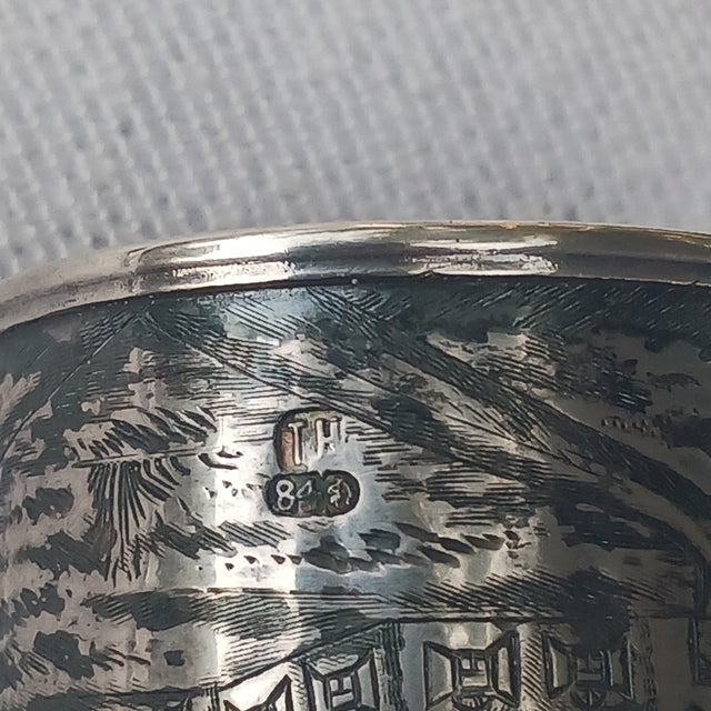 A rare and historically significant 84 Zolotnik silver napkin ring from the late 19th century. This piece is a masterclass...