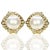 18k Earrings with two 9.7mm South Sea Pearls and 44 round and 28 baguette diamonds weighing approximately 1.50 carats....