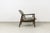 A vintage GFM-64 armchair designed by Edmund Homa, produced by the Gościcińska Fabryka Mebli (GFM) in Poland during the...