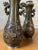 Bring a touch of exoticism and refinement to your decoration with this elegant pair of antique bronze vases dating from...