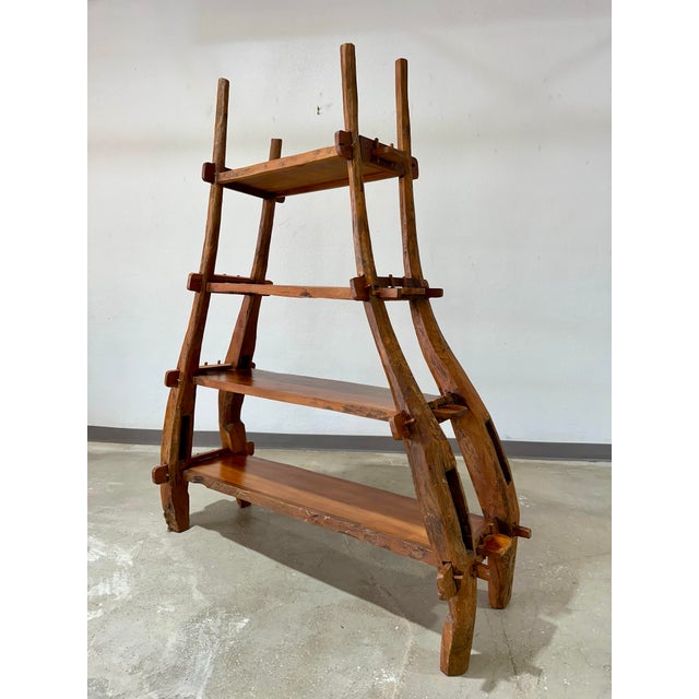 Vintage Primitive style hand carved wooden display shelf or bookcase. Origin unknown but likely European. Lovely organic...