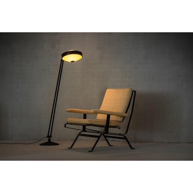A super rare and highly versatile floor lamp, designed and produced by stilnovo in italy around 1960. This striking piece...