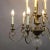 Vintage 20th Century French Nine-Light Tiered Brass and Crystal Chandelier For Sale - Image 9 of 13