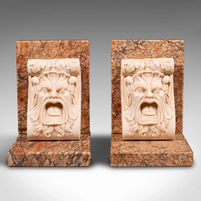 This is a pair of vintage decorative bookends. An Italian, marble book rest in classical taste, dating to the Art Deco...
