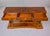 A sophisticated console showcasing exceptional crotch walnut veneered panels and dramatic sunburst marquetry top. Three...