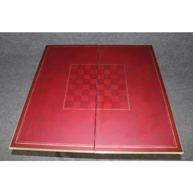 This an absolutely superbly crafted French Directoire style chess or checkers table. The top is absolutely gorgeous flame...