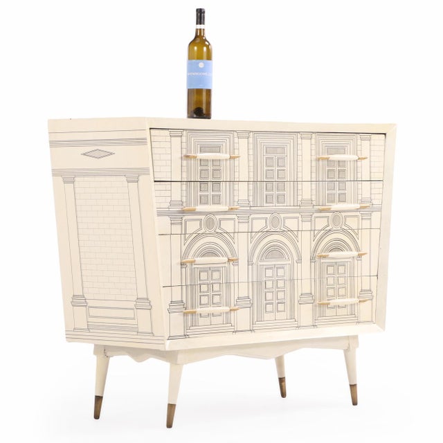 An evocative and collectible piece, merging classical architecture with whimsical Italian design. A striking mid-century...