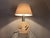 Travertine lamp from the 1960s/70s. New textile cable, cord switch, and plug. Height with shade: 46 cm. Lampshade...
