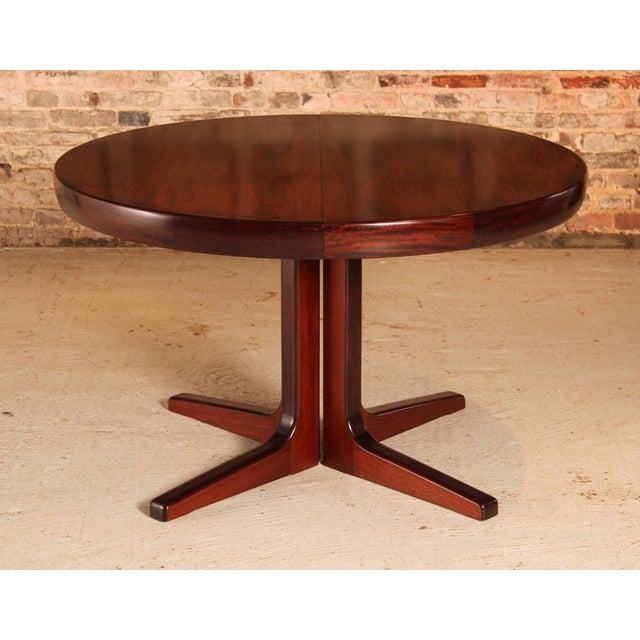 Danish Mid Century extending rosewood dining table, circa 1970s. 2 extension leaves, Extends to 220cm to seat up to 10...