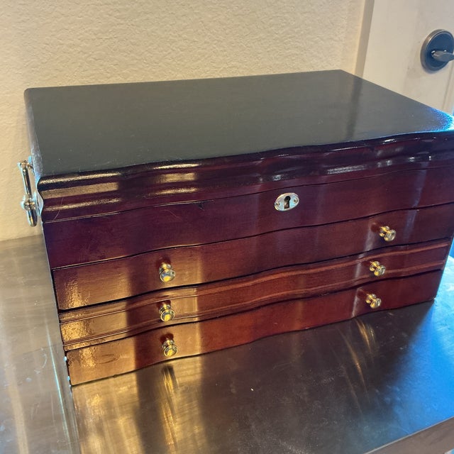Timeless elegance meets practical storage with this large Jewelry Box, Chest . Designed with a sophisticated four-square...