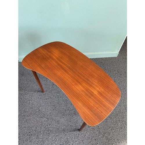 Teak coffee table – denmark (1960s) bring home the timeless elegance of 1960s danish design with this refined teak side...