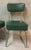 This set of six desk chairs from the 1950s are made of green bottle colored skai with chromed steel bases.