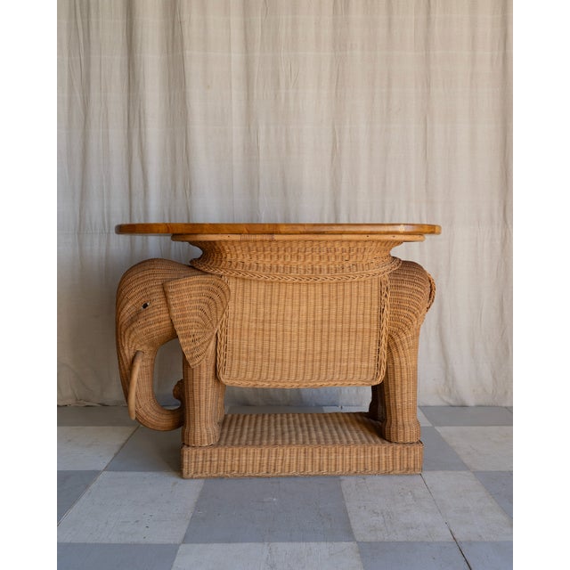 Bring a splash of fun to your home with the Vintage Elephant Wicker Bar Cart! This charming piece features a whimsical...