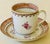Chinese export Famille Rose porcelain demitasse cup and saucer made for the British East India Company, late 19th C. This...