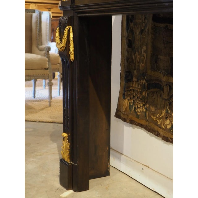 Early 20th Century French Louis XVI Style Ebonized Wooden Mantel With Gilt Bronze Mounts, 20th C. For Sale - Image 5 of 12
