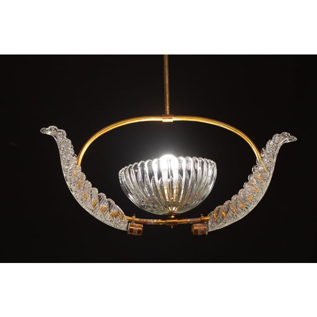 Pretty Murano chandelier attributed to Ercole Barovier. The chandelier measures 75 centimeters in height, 30 centimeter...