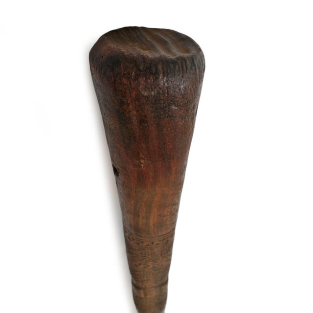 Large Tuareg wood pestle stick. Each unique with hand carved patterns and form. Wonderful as unique decor and makes for a...