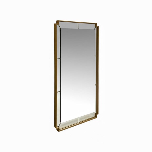 The Davis Mirror features a modern rectangular design with angled mirrored panels and a sleek frame. Its clean lines and...