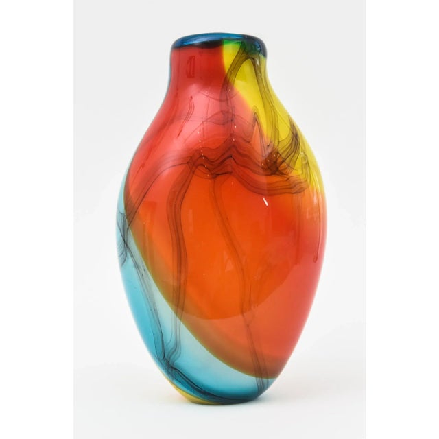 This very happy and colorful signed vintage Murano hand blown glass vase and or vessel is by Fratelli and says on the...
