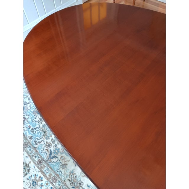 Early 20th Century French Louis XVI–style Oval Dining Table in Solid Cherry With Two Extension Leaves, Offering Flexible Seating and Classic Neoclassical. For Sale - Image 5 of 5