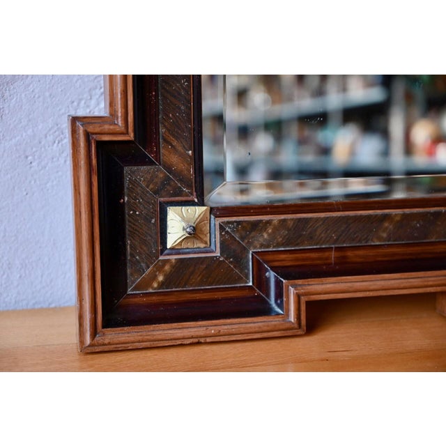 This lovely antique mirror possesses a charmingly bohemian, Art Deco-inspired feel. with its wide, molded frame in various...