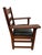 This antique Arts & Crafts Mission oak arm chair embodies the timeless craftsmanship and honest design principles of the...