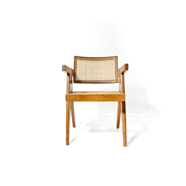The chair is a design by the Swiss architect and furniture designer Pierre Jeanneret (1896 - 1967). Origin Chandigarh/...