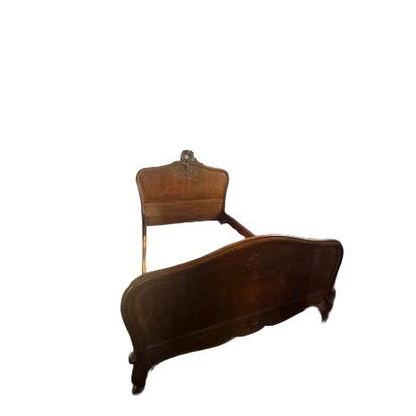 Exceptional Antique Tiger Oak Full-Size Bed in the French Louis XV An exceptional antique full-size bed executed in richly...
