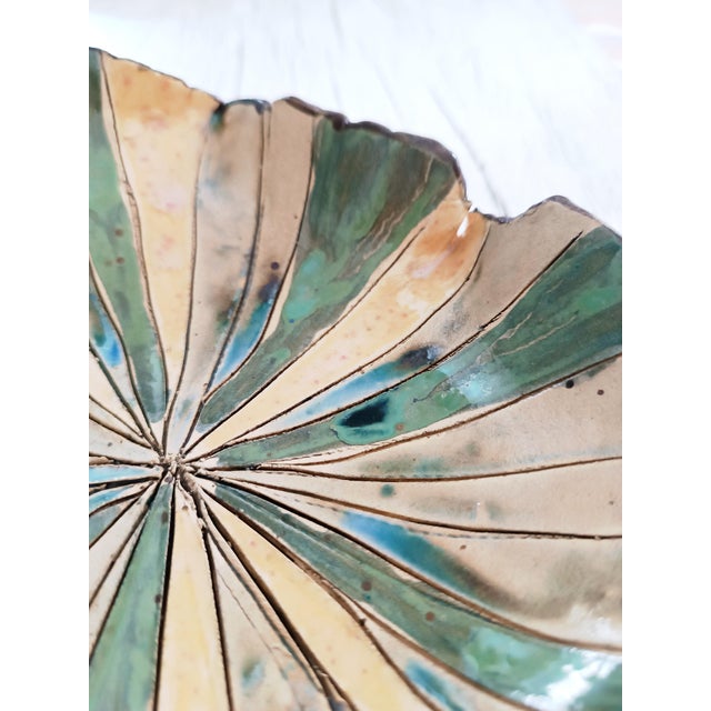 Plate/tray. Suitable as a candle holder or object holder. The piece is entirely handcrafted; the first firing (first...