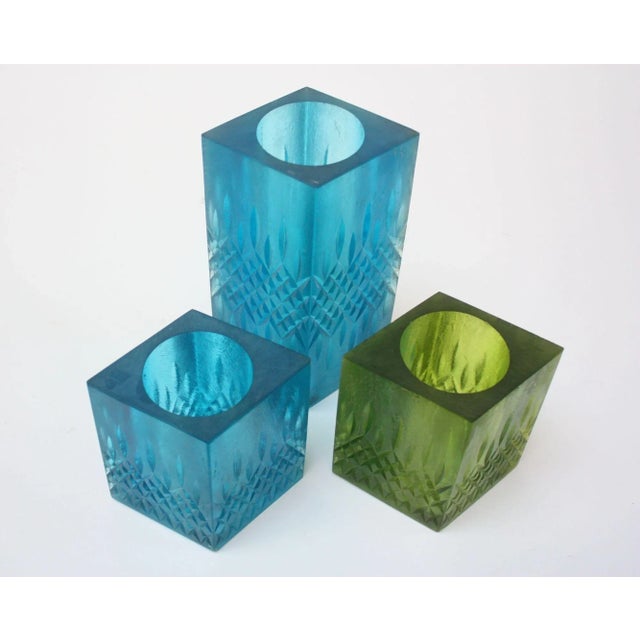 Uncommon examples from Sascha Brastoff, most notable for enamel works, this set of four diamond-shaped vases/candle...